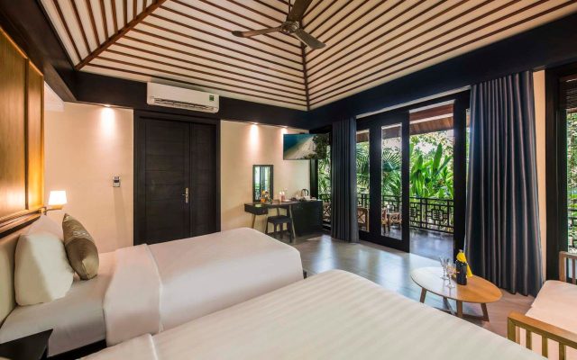 Hòn Tằm Resort - Deluxe Bungalow hướng vườn 2 giường đơn